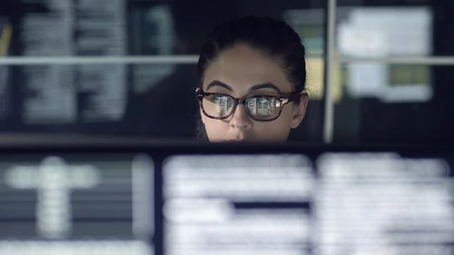  Woman monitors data 